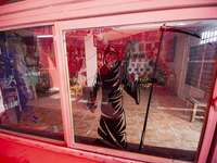 An image of Santa Muerte is seen inside the temple in the municipality of Pedro Escobedo during the annual celebrations. Every year on Novem...