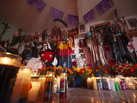 An image of Santa Muerte is seen inside the temple in the municipality of Pedro Escobedo during the annual celebrations. Every year on Novem...