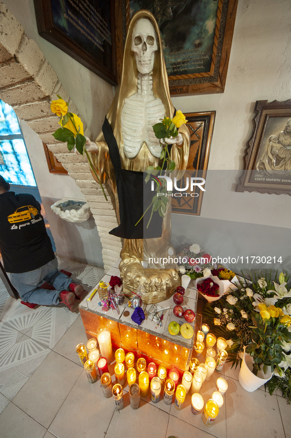 An image of Santa Muerte is seen inside the temple in the municipality of Pedro Escobedo during the annual celebrations. Every year on Novem...