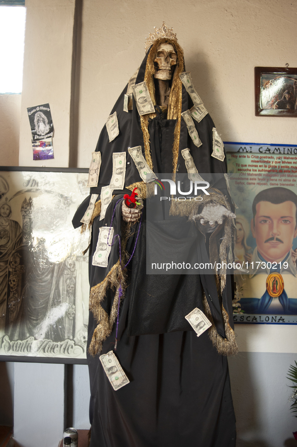 An image of Santa Muerte is seen inside the temple in the municipality of Pedro Escobedo during the annual celebrations. Every year on Novem...