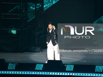 Singer Andy Lau performs at the Taipei Arena during the first leg of his ''Today is the Day'' tour in Taipei, Taiwan province, China, on Nov...