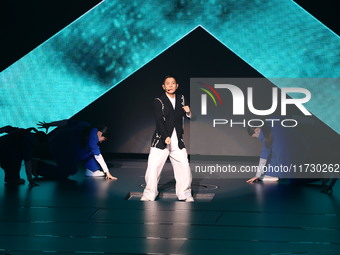 Singer Andy Lau performs at the Taipei Arena during the first leg of his ''Today is the Day'' tour in Taipei, Taiwan province, China, on Nov...