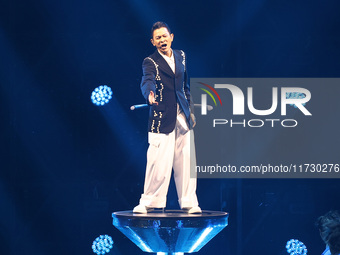 Singer Andy Lau performs at the Taipei Arena during the first leg of his ''Today is the Day'' tour in Taipei, Taiwan province, China, on Nov...