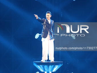 Singer Andy Lau performs at the Taipei Arena during the first leg of his ''Today is the Day'' tour in Taipei, Taiwan province, China, on Nov...