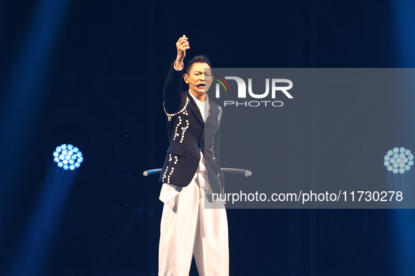 Singer Andy Lau performs at the Taipei Arena during the first leg of his ''Today is the Day'' tour in Taipei, Taiwan province, China, on Nov...