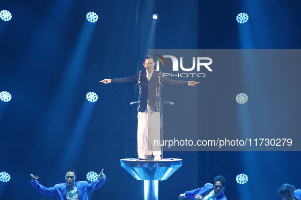 Singer Andy Lau performs at the Taipei Arena during the first leg of his ''Today is the Day'' tour in Taipei, Taiwan province, China, on Nov...