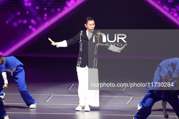 Singer Andy Lau performs at the Taipei Arena during the first leg of his ''Today is the Day'' tour in Taipei, Taiwan province, China, on Nov...