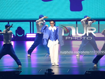 Singer Andy Lau performs at the Taipei Arena during the first leg of his ''Today is the Day'' tour in Taipei, Taiwan province, China, on Nov...