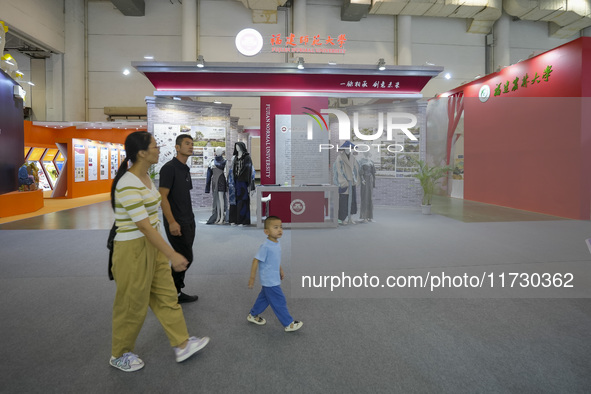 Visitors visit the site of the 15th Cross-Strait Cultural Expo in Xiamen, China, on November 1, 2024. 