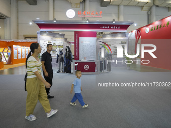 Visitors visit the site of the 15th Cross-Strait Cultural Expo in Xiamen, China, on November 1, 2024. (