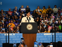 Belcalis Marlenis Cephus, known professionally as Cardi B (shown), an American rapper and songwriter, speaks at a campaign rally supporting...