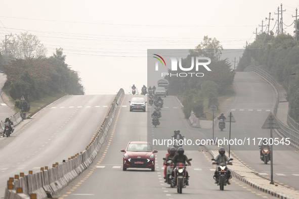 Kathmandu Valley is shrouded under a thick blanket of polluted smog as the pollution level rises in the bowl-shaped valley in Kathmandu, Nep...