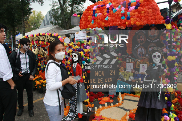 People attend the twenty-seventh edition of the University Day of the Dead Festival ''Mega Ofrenda UNAM 2024, Mexico Seen Through the Lens,'...