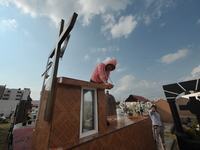 A person decorates the graves of her loved ones with cempasuchil flowers and holds a vigil at the Municipal Cemetery of Amealco de Bonfil. A...