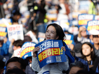 Tens of thousands of Democratic Party members, citizens, and lawmakers attend the protest in front of Seoul Station, calling for a special i...