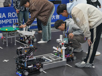 Visitors watch a robot perform at the China Robot Competition in Xi'an, China, on November 2, 2024. (