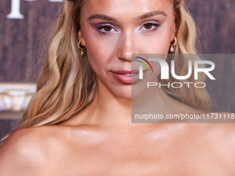 Alexis Ren arrives at Darren Dzienciol's Haunted Hotel Halloween Party 2024 presented by UTOPIA and Casa Azul Organic Tequila held at the Fa...