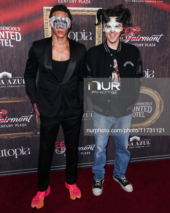 Paris Brosnan (R) arrives at Darren Dzienciol's Haunted Hotel Halloween Party 2024 presented by UTOPIA and Casa Azul Organic Tequila held at...