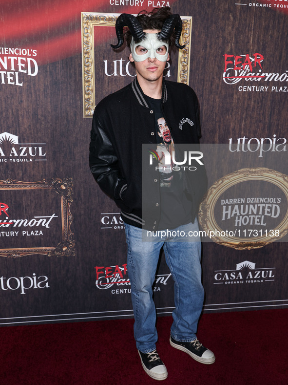 Paris Brosnan arrives at Darren Dzienciol's Haunted Hotel Halloween Party 2024 presented by UTOPIA and Casa Azul Organic Tequila held at the...