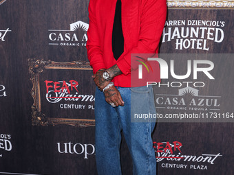 Alexander Edwards arrives at Darren Dzienciol's Haunted Hotel Halloween Party 2024 presented by UTOPIA and Casa Azul Organic Tequila held at...