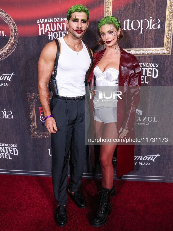 Marvin Brooks and Carmella Rose arrive at Darren Dzienciol's Haunted Hotel Halloween Party 2024 presented by UTOPIA and Casa Azul Organic Te...