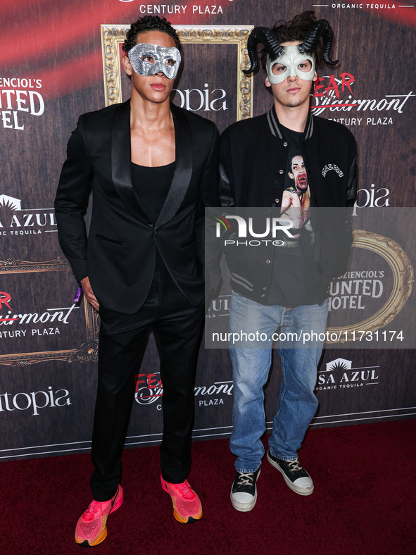 Paris Brosnan (R) arrives at Darren Dzienciol's Haunted Hotel Halloween Party 2024 presented by UTOPIA and Casa Azul Organic Tequila held at...