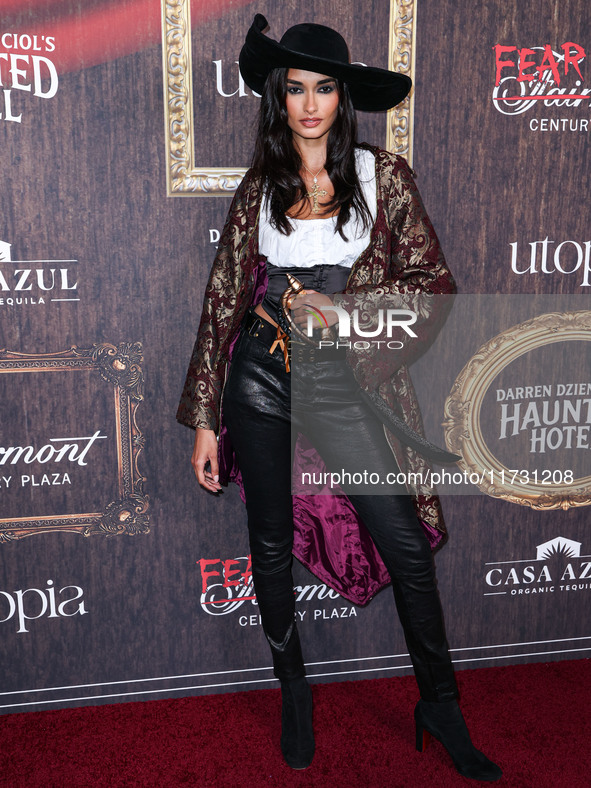 Gizele Oliveira arrives at Darren Dzienciol's Haunted Hotel Halloween Party 2024 presented by UTOPIA and Casa Azul Organic Tequila held at t...