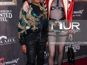 James Goldstein and Tamara Buckley arrive at Darren Dzienciol's Haunted Hotel Halloween Party 2024 presented by UTOPIA and Casa Azul Organic...