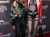 James Goldstein and Tamara Buckley arrive at Darren Dzienciol's Haunted Hotel Halloween Party 2024 presented by UTOPIA and Casa Azul Organic...