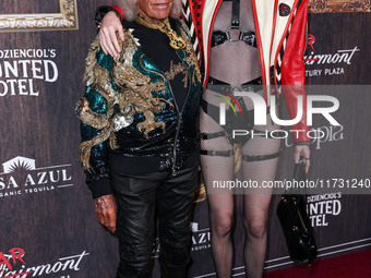 James Goldstein and Tamara Buckley arrive at Darren Dzienciol's Haunted Hotel Halloween Party 2024 presented by UTOPIA and Casa Azul Organic...