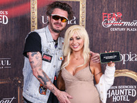 Ian Passmore and Rio Sage arrive at Darren Dzienciol's Haunted Hotel Halloween Party 2024 presented by UTOPIA and Casa Azul Organic Tequila...