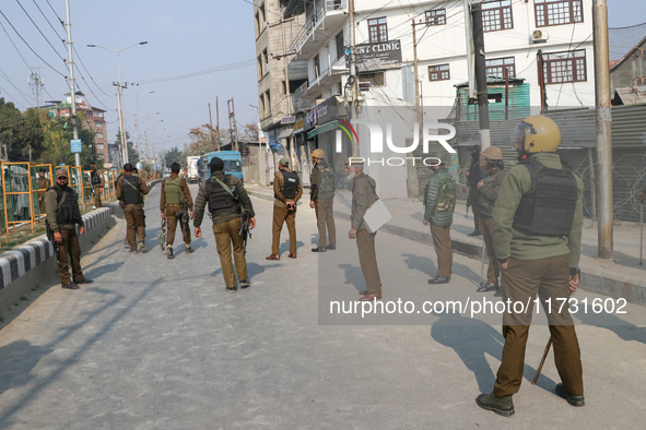 Indian police forces remain alert near the encounter site in Srinagar, Indian Administered Kashmir, on November 2, 2024. Three militants are...