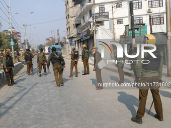 Indian police forces remain alert near the encounter site in Srinagar, Indian Administered Kashmir, on November 2, 2024. Three militants are...