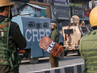 Indian police forces remain alert near the encounter site in Srinagar, Indian Administered Kashmir, on November 2, 2024. Three militants are...