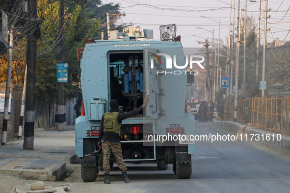 Indian paramilitary troopers remain alert near the encounter site in Srinagar, Indian Administered Kashmir, on November 2, 2024. Three milit...