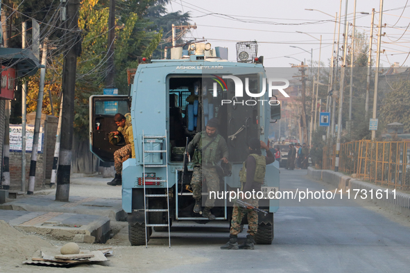 Indian paramilitary troopers remain alert near the encounter site in Srinagar, Indian Administered Kashmir, on November 2, 2024. Three milit...