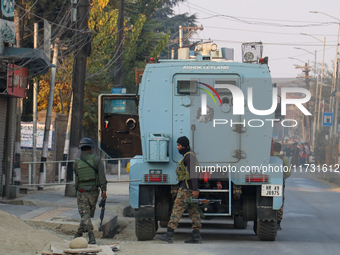 Indian paramilitary troopers remain alert near the encounter site in Srinagar, Indian Administered Kashmir, on November 2, 2024. Three milit...