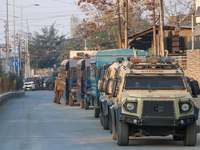 Armored paramilitary vehicles are near the encounter site in Srinagar, Indian Administered Kashmir, on November 2, 2024. Three militants are...