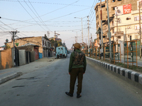 Indian police forces remain alert near the encounter site in Srinagar, Indian Administered Kashmir, on November 2, 2024. Three militants are...