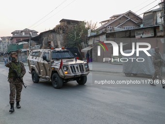 Indian paramilitary troopers patrol near the encounter site in Srinagar, Indian Administered Kashmir, on November 2, 2024. Three militants a...