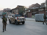 Indian paramilitary troopers patrol near the encounter site in Srinagar, Indian Administered Kashmir, on November 2, 2024. Three militants a...