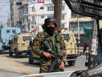 Indian paramilitary troopers remain alert near the encounter site in Srinagar, Indian Administered Kashmir, on November 2, 2024. Three milit...