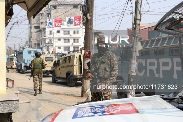 Indian paramilitary troopers remain alert near the encounter site in Srinagar, Indian Administered Kashmir, on November 2, 2024. Three milit...