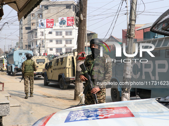 Indian paramilitary troopers remain alert near the encounter site in Srinagar, Indian Administered Kashmir, on November 2, 2024. Three milit...