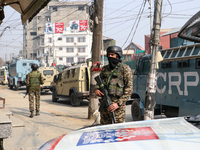 Indian paramilitary troopers remain alert near the encounter site in Srinagar, Indian Administered Kashmir, on November 2, 2024. Three milit...