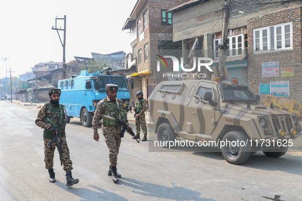 Indian paramilitary troopers patrol near the encounter site in Srinagar, Indian Administered Kashmir, on November 2, 2024. Three militants a...