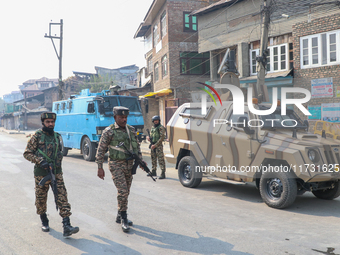 Indian paramilitary troopers patrol near the encounter site in Srinagar, Indian Administered Kashmir, on November 2, 2024. Three militants a...