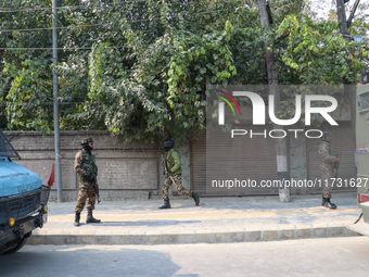 Indian paramilitary troopers patrol near the encounter site in Srinagar, Indian Administered Kashmir, on November 2, 2024. Three militants a...