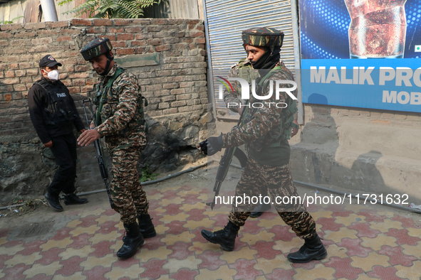 Indian paramilitary troopers patrol near the encounter site in Srinagar, Indian Administered Kashmir, on November 2, 2024. Three militants a...