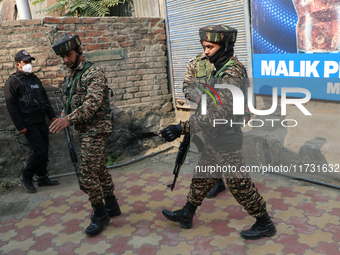 Indian paramilitary troopers patrol near the encounter site in Srinagar, Indian Administered Kashmir, on November 2, 2024. Three militants a...